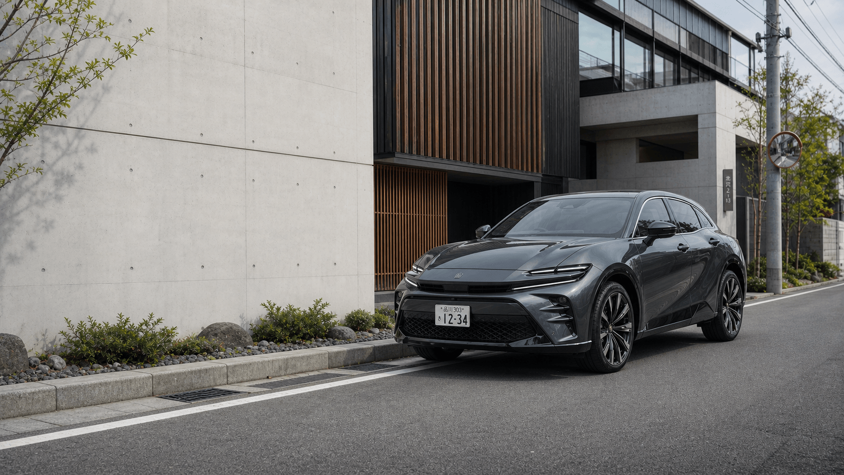 Dark metallic grey Toyota Crown Sport on a contemporary Japanese residential street